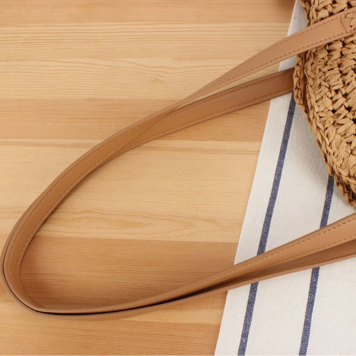 Round straw bag with leather handles Kalsten
