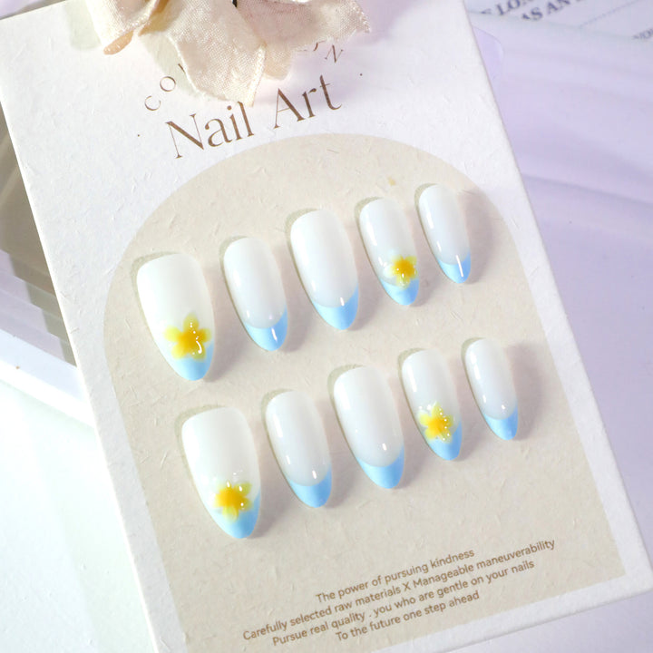 Artfully designed nail extensions with floral accent Kalsten