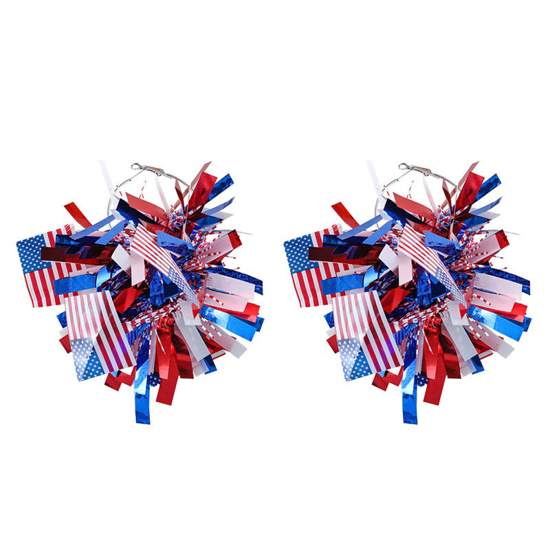 Women with eye-catching pompom hoops with lametta tassels and lightweight wire closure Kalsten