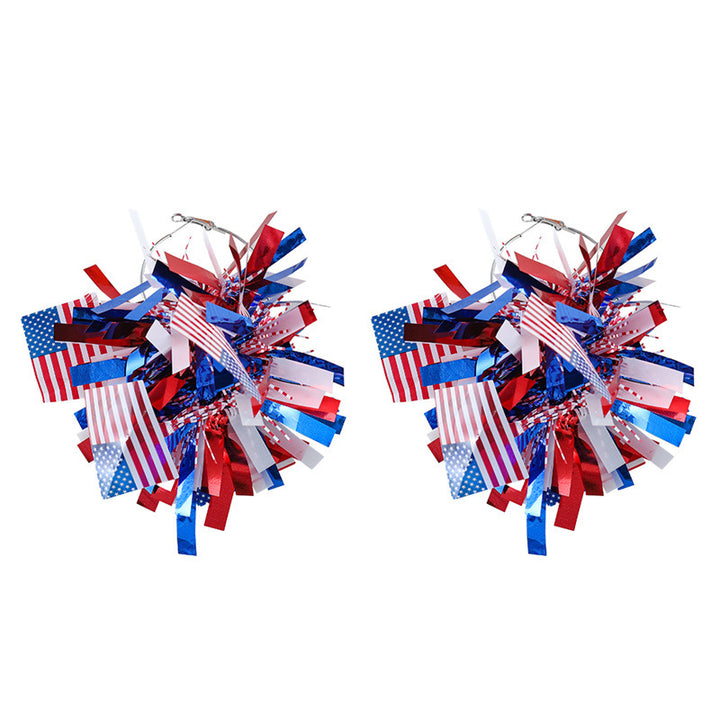 Women with eye-catching pompom hoops with lametta tassels and lightweight wire closure Kalsten