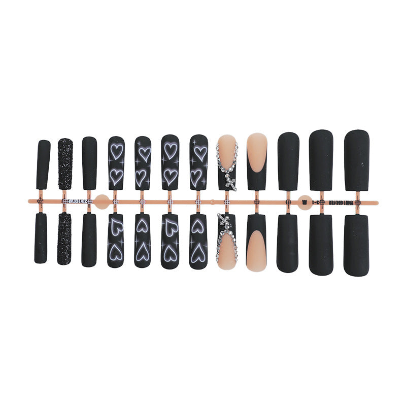Artificial nail set with elegant glitter and heart designs Kalsten