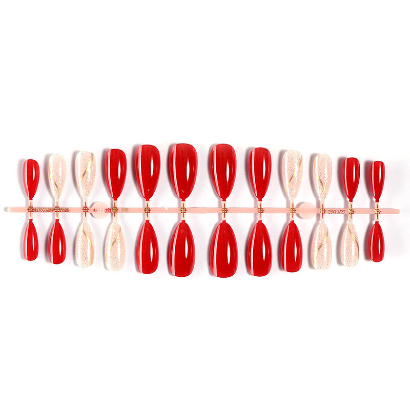 Artificial nail set with shiny red surface and stylish accents Kalsten