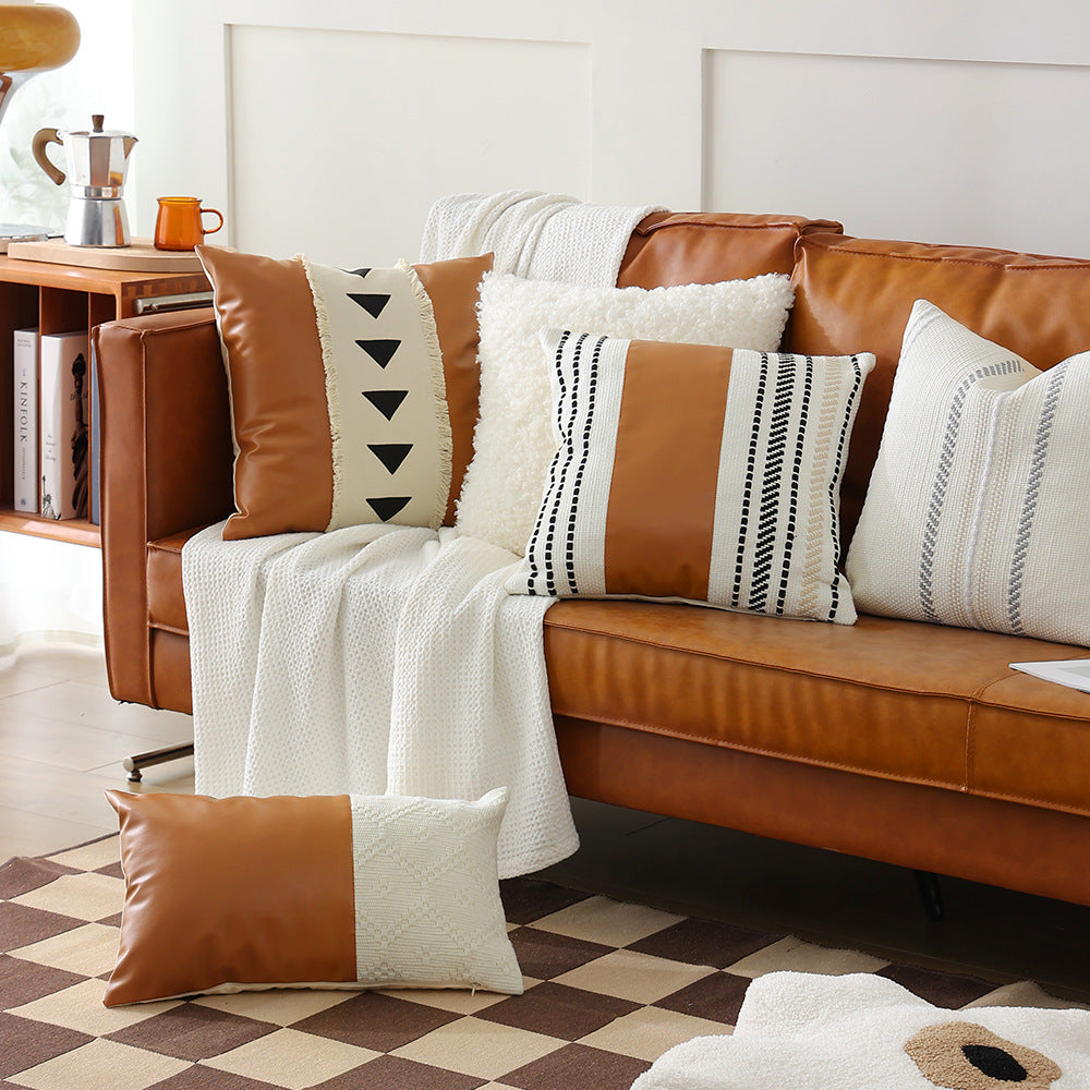 Decorative cushion cover made of faux leather with woven ethnic stripe Kalsten