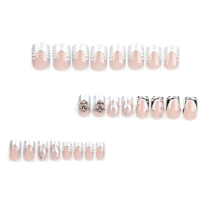 Artistic nail extensions with metallic embellishments Kalsten