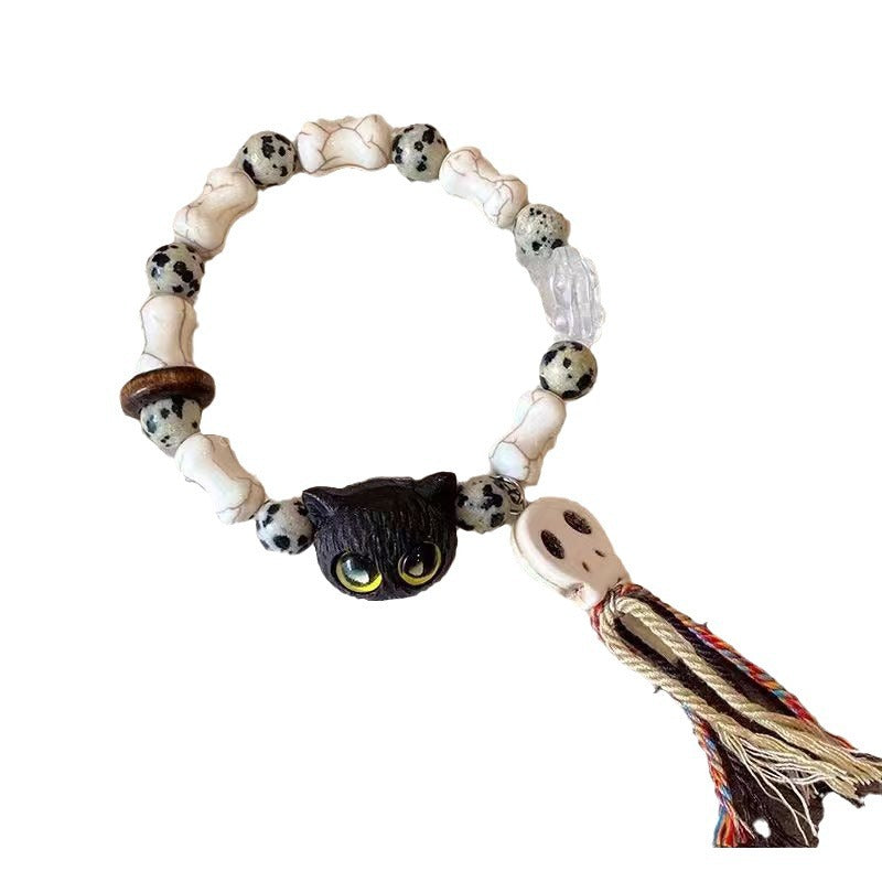 Whimsical Cat and Bone Charm Bracelet Kalsten