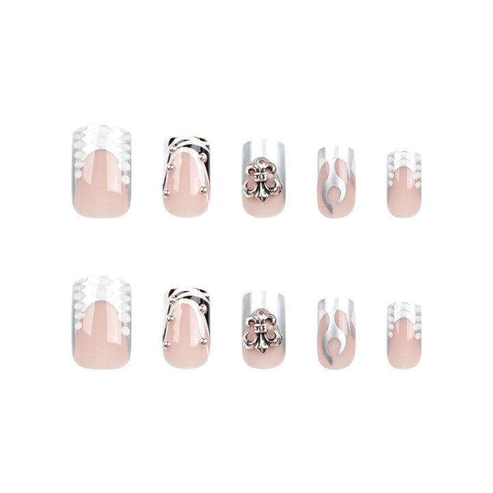 Artistic nail extensions with metallic embellishments Kalsten