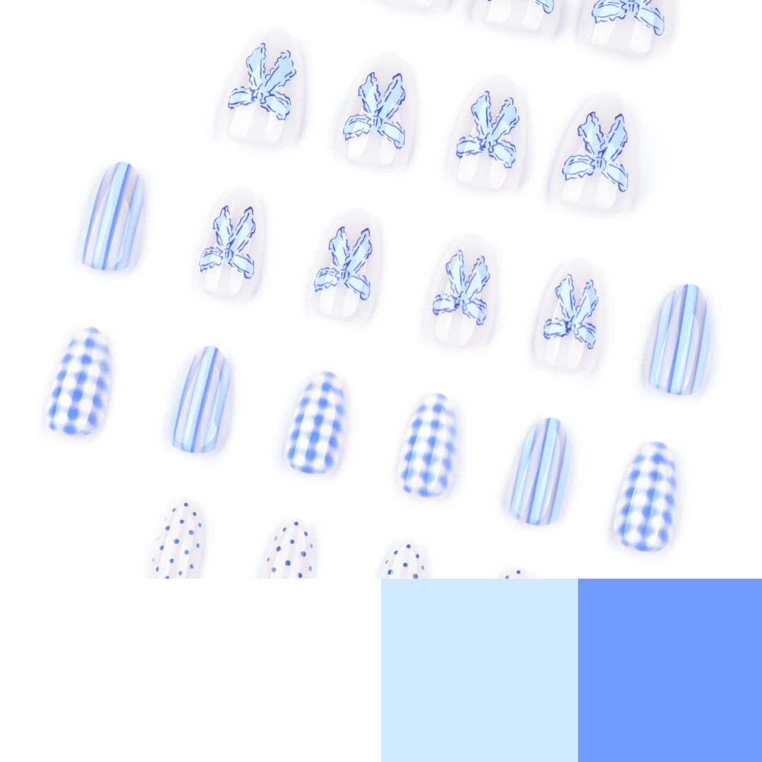 Artistic Nail Art with Floral and Polka Dot Designs Kalsten
