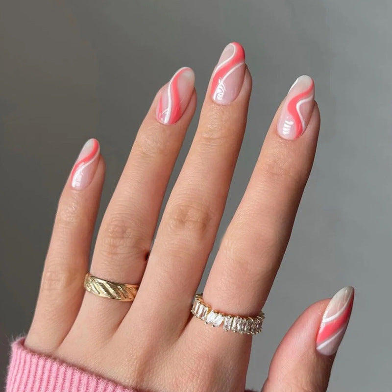 Artful nail extensions with an elegant leaf pattern Kalsten
