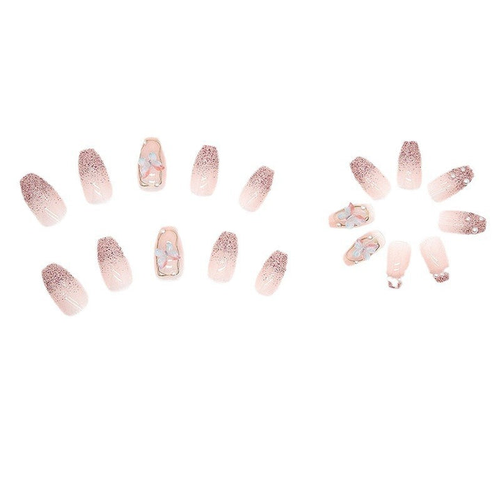 Artificial nails with elegant ombre design and delicate accents Kalsten
