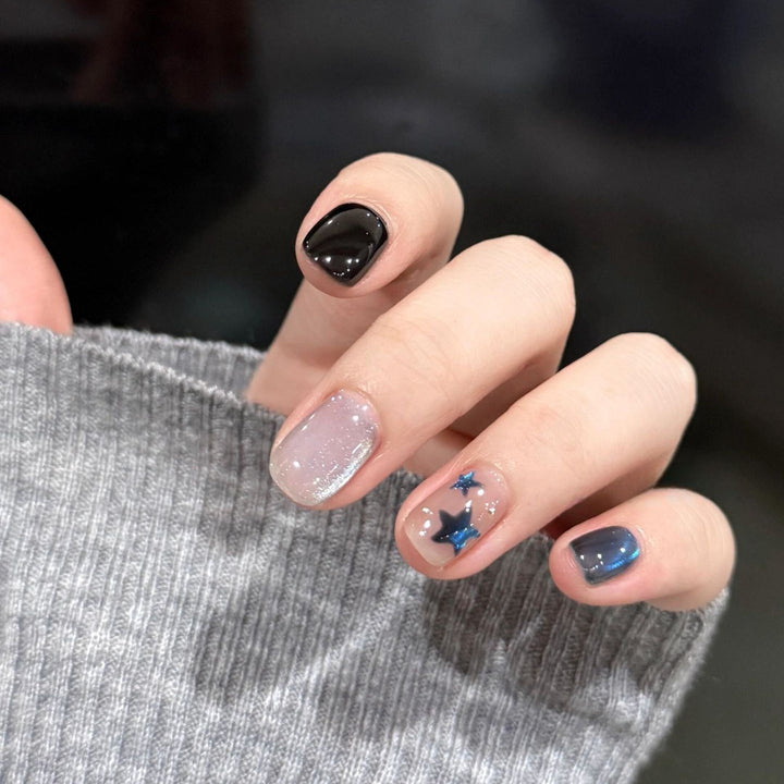 Artificial nails with elegant star design and shimmering effects Kalsten