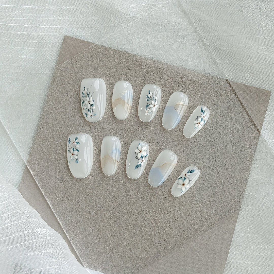 Artistic Press-On Nail Art Set with Heart and Celestial Designs