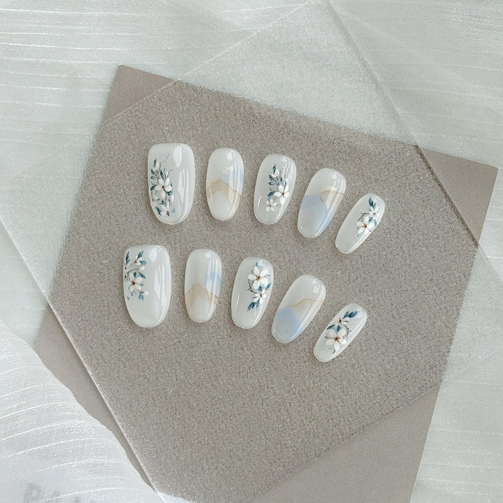 Artistic Press-On Nail Art Set with Heart and Celestial Designs