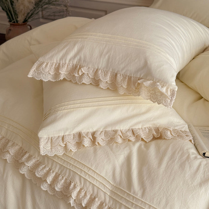 Romantic bedding set with lace ruffles and fine cotton texture