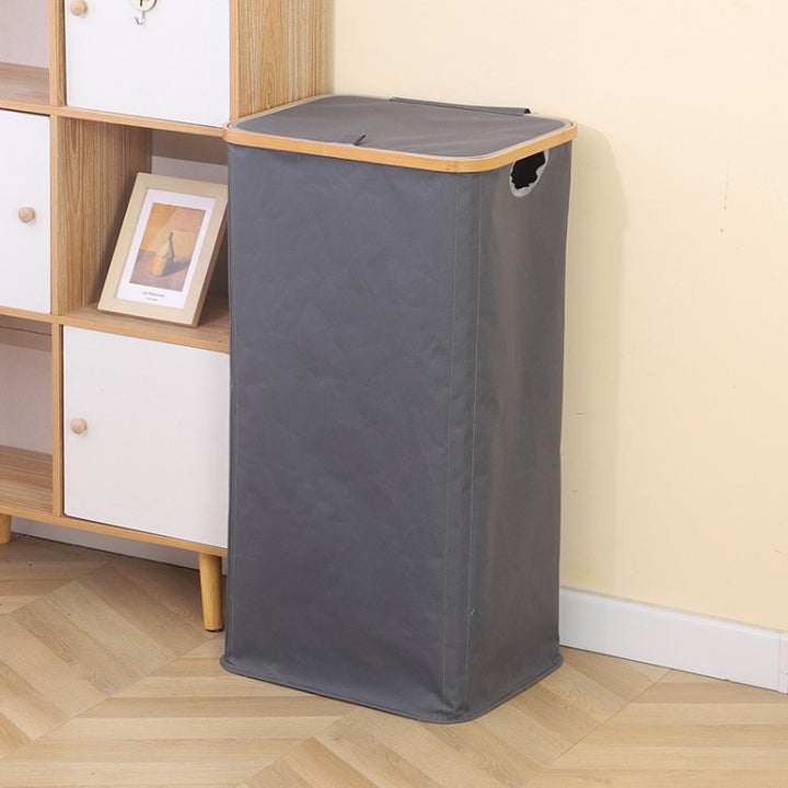 Stylish laundry basket with wooden lid Kalsten