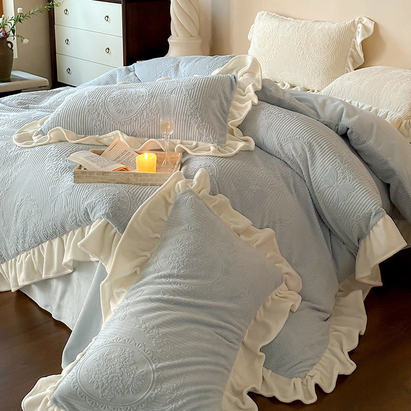 Ruffled quilted bedding set with jacquard medallion and ruffle
