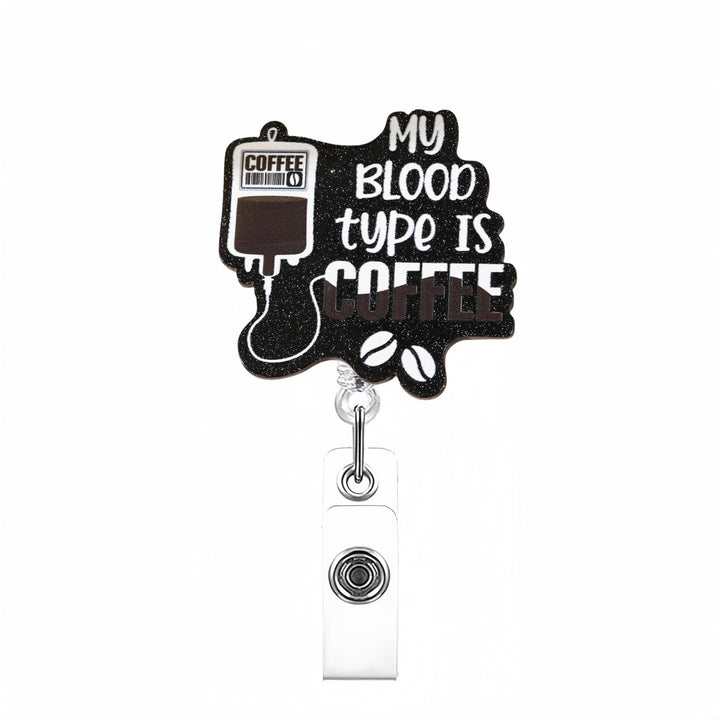 Expandable badge holder with anatomical heart pendant