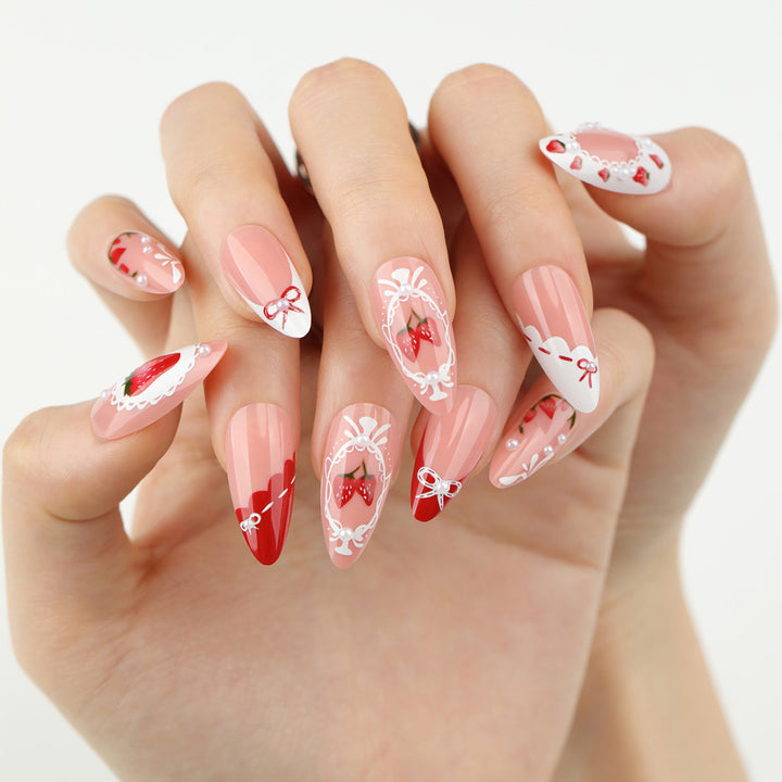 Artful nail extensions with strawberry motifs Kalsten