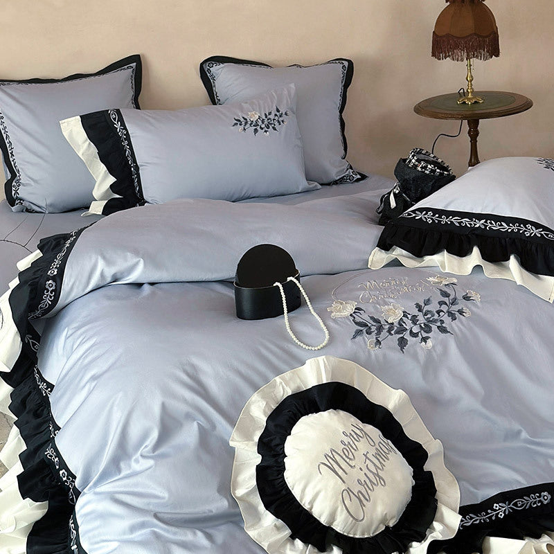 Elegant bed linen set made of cotton satin with embroidery, contrasting frill and round cushion