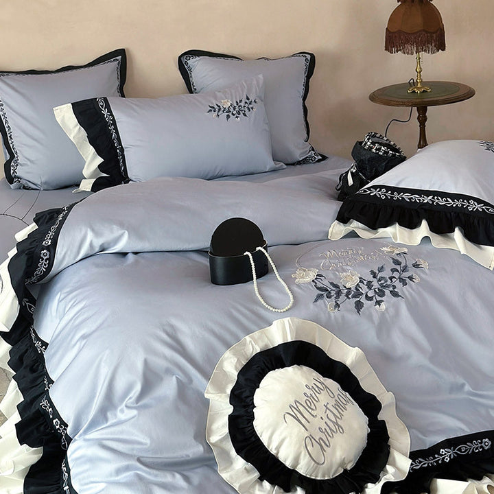 Elegant bed linen set made of cotton satin with embroidery, contrasting frill and round cushion