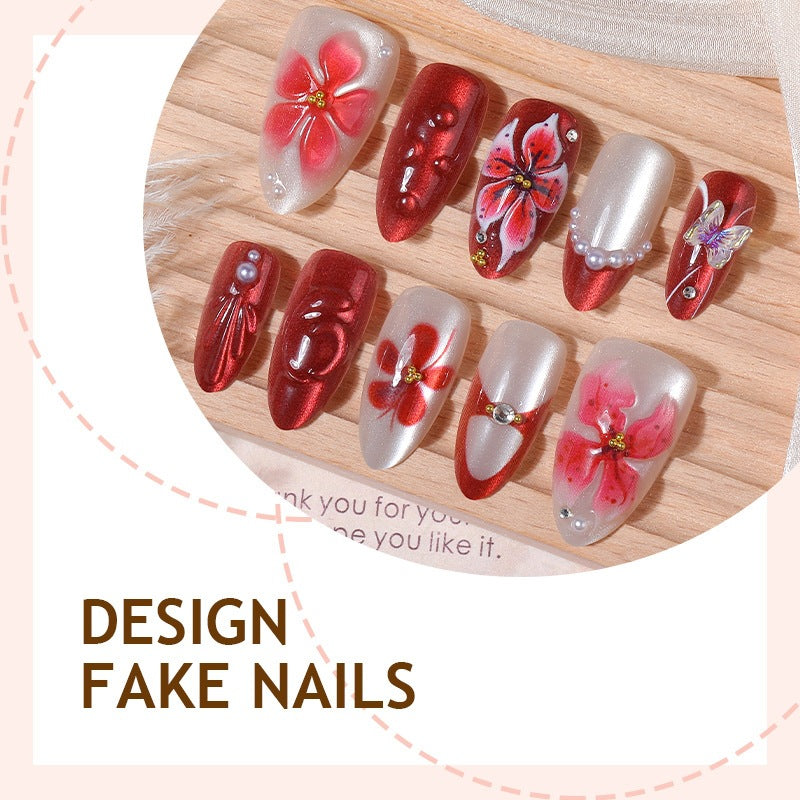 Artificial nail set with floral designs and glamorous accents Kalsten