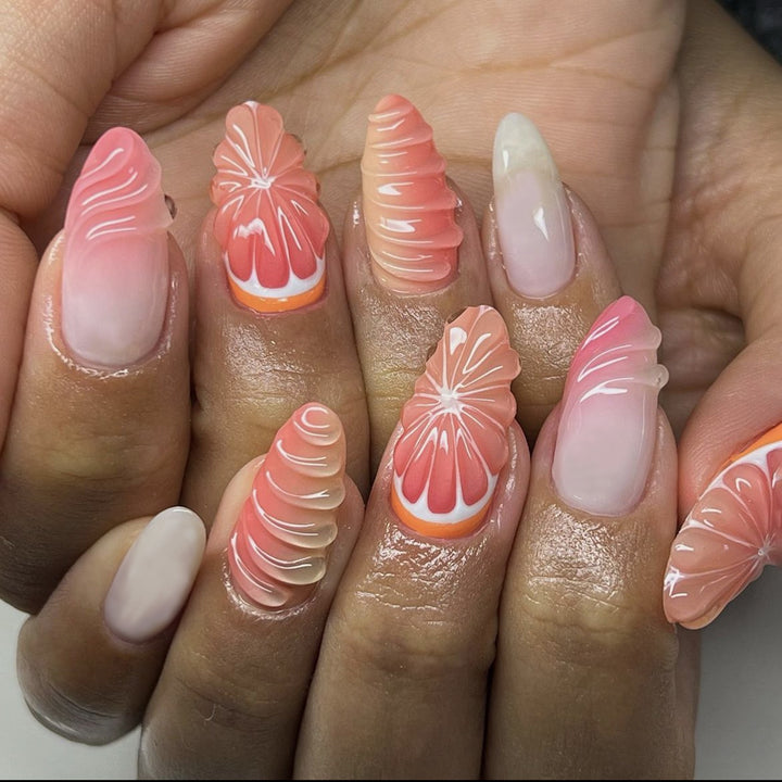 Creative nail set with subtle ombre effects and elegant decorative elements Kalsten