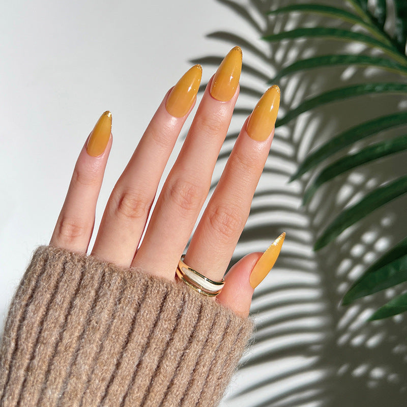 Artificial stiletto nails with glamorous glitter accent Kalsten