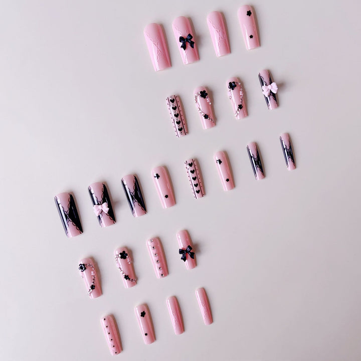 Fake nail set with playful 3D roses and elegant accents Kalsten