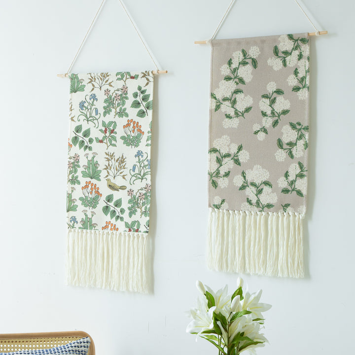 Woven wall hanging with floral jacquard structure and long fringes Kalsten
