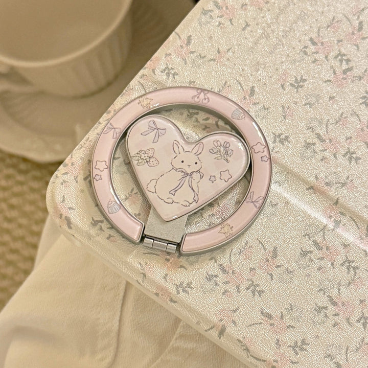 Playful smartphone finger holder with heart design Kalsten
