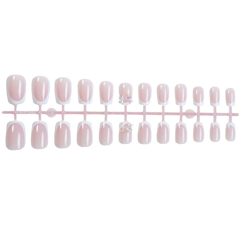 Elegant artificial nails with delicate glitter and decorative accents Kalsten