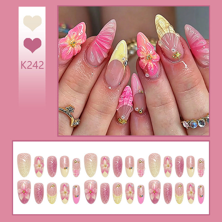 Art nail set with filigree flower decorations and glitter elements Kalsten