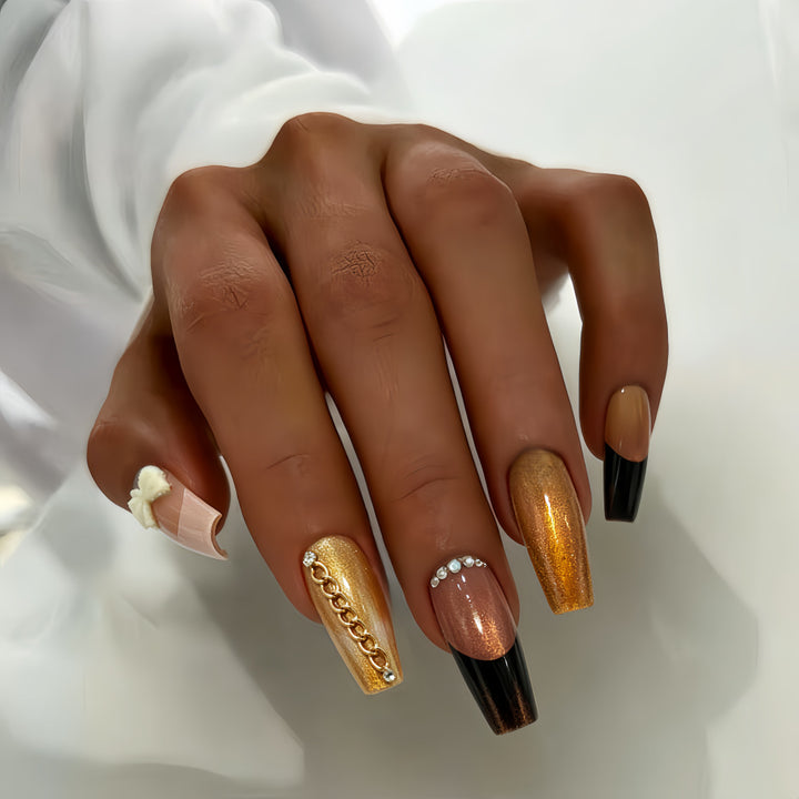 Glamorous artificial nails with glittering design and elegant embellishments Kalsten
