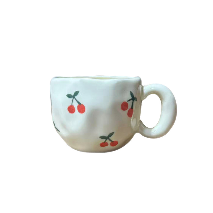 Ceramic mug with hand-painted tulip pattern and organic shape