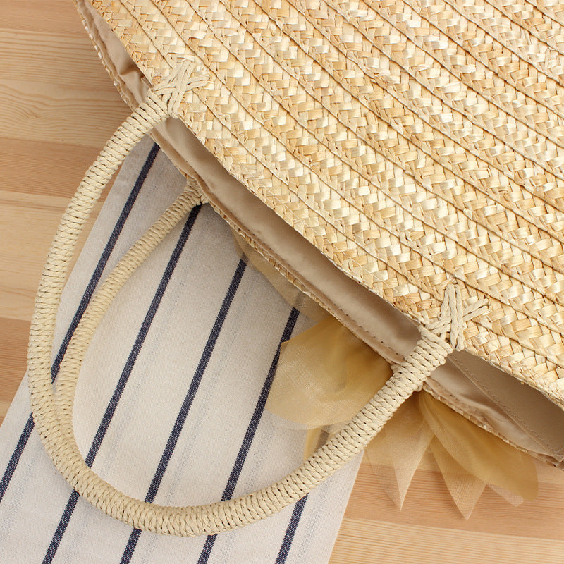 Elegant straw bag with floral accents Kalsten