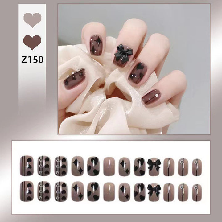 Artificial nails with elegant ribbon and heart designs Kalsten
