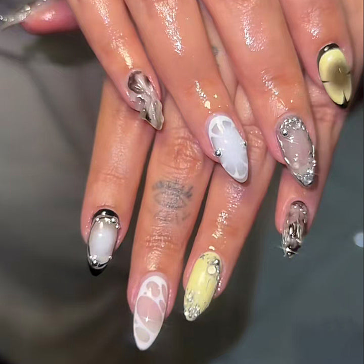 Artistic nail art with sophisticated accents Kalsten