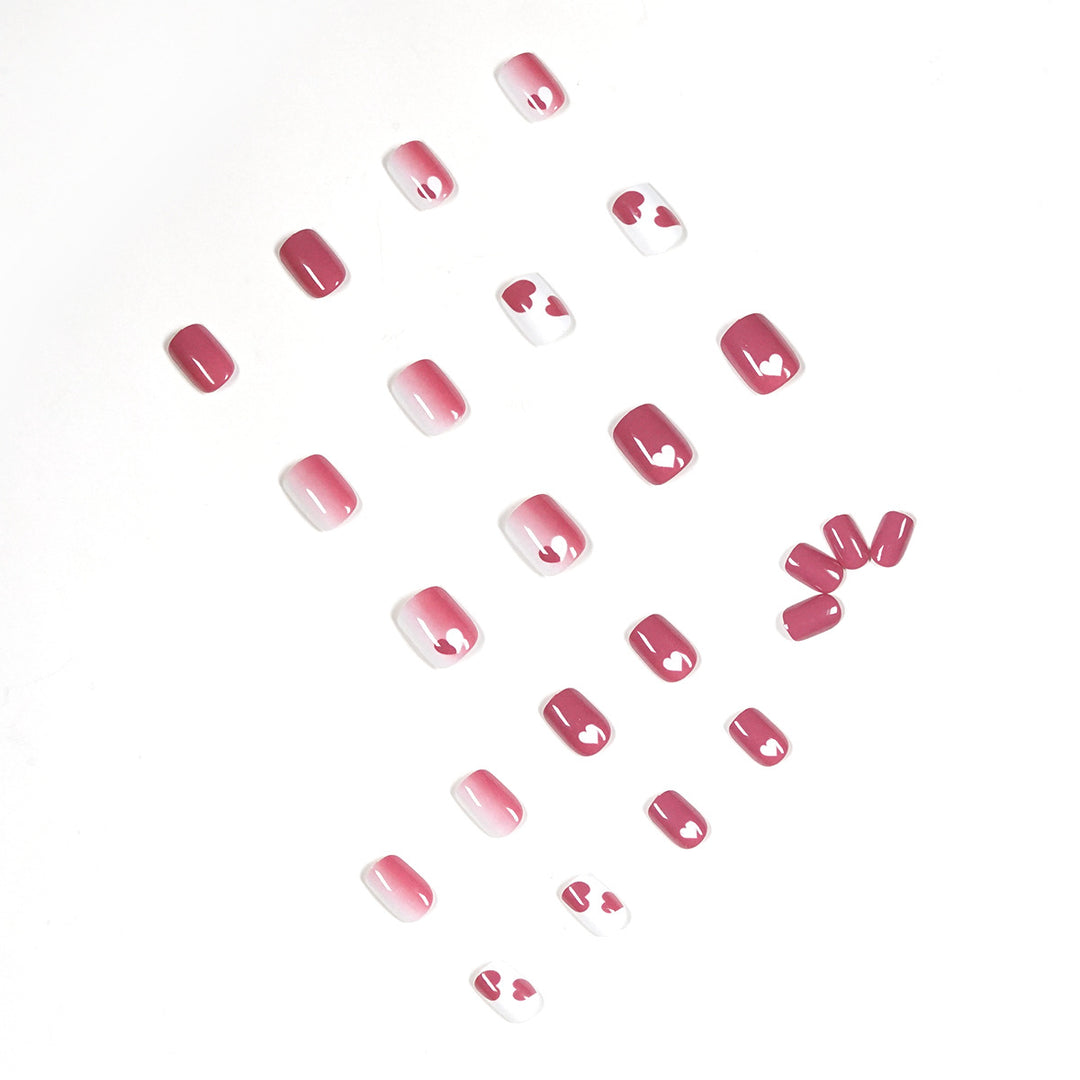 Creative nail art with heart motif and high-gloss finish Kalsten