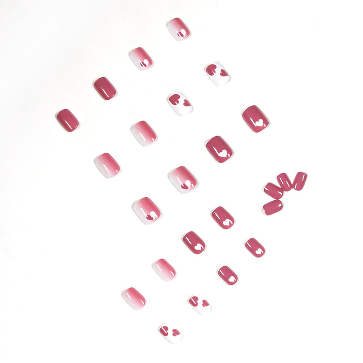 Creative nail art with heart motif and high-gloss finish Kalsten