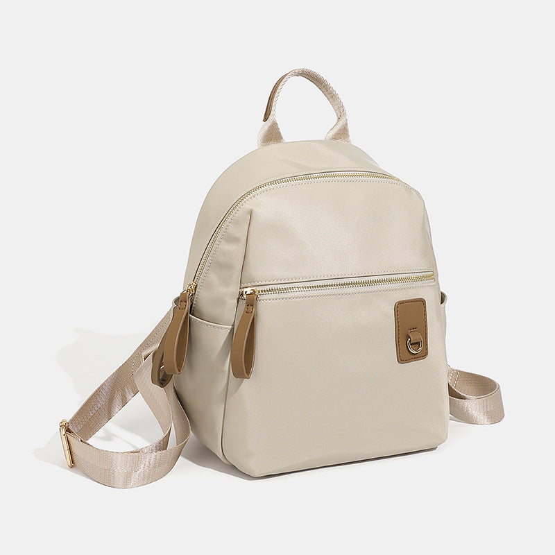 Compact Nylon Backpack with Multiple Pockets