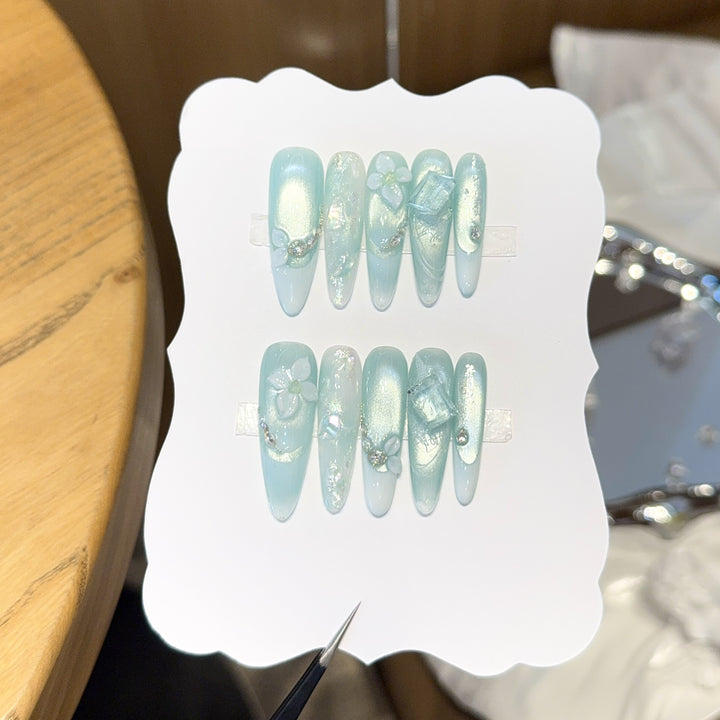 Artificial nails with floral designs and glitter effects Kalsten