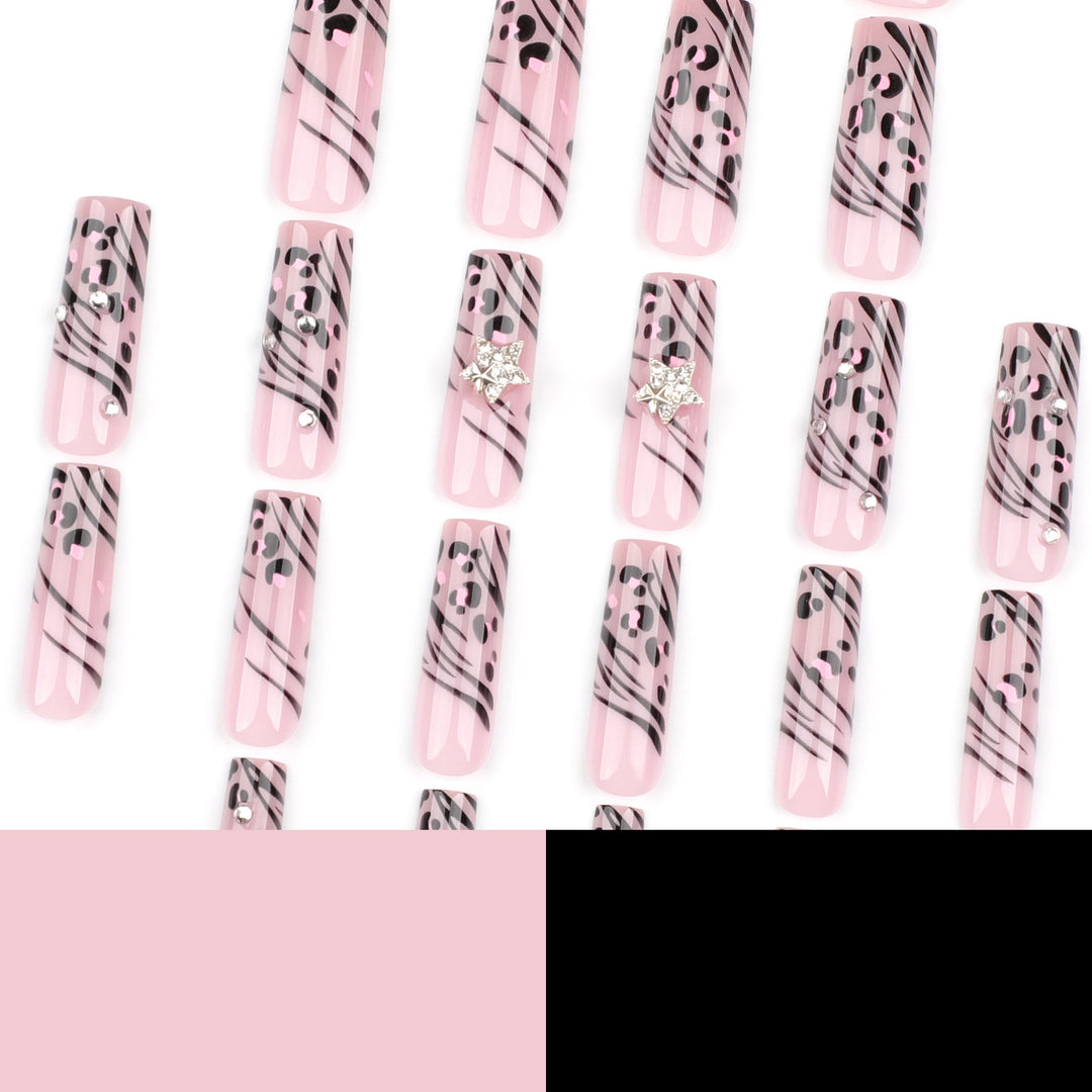 Artful Nail Art with Zebra Pattern and Glitter Accents Kalsten