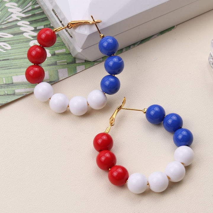 Ladies nan pearl earrings with stacked sphere beads and gold-colored snap clasp Kalsten