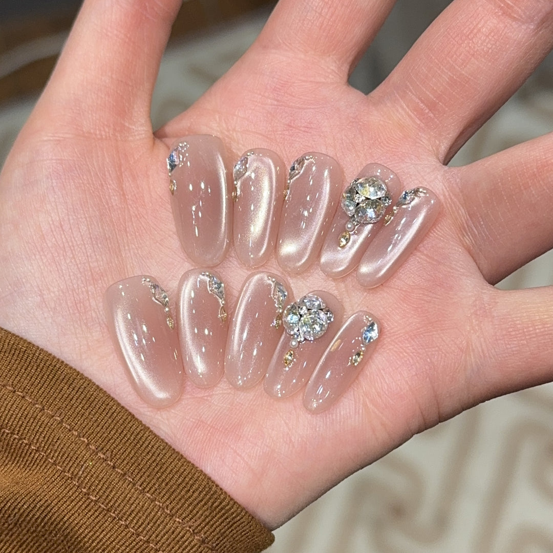 Glamorous artificial nails with rhinestone embellishments Kalsten