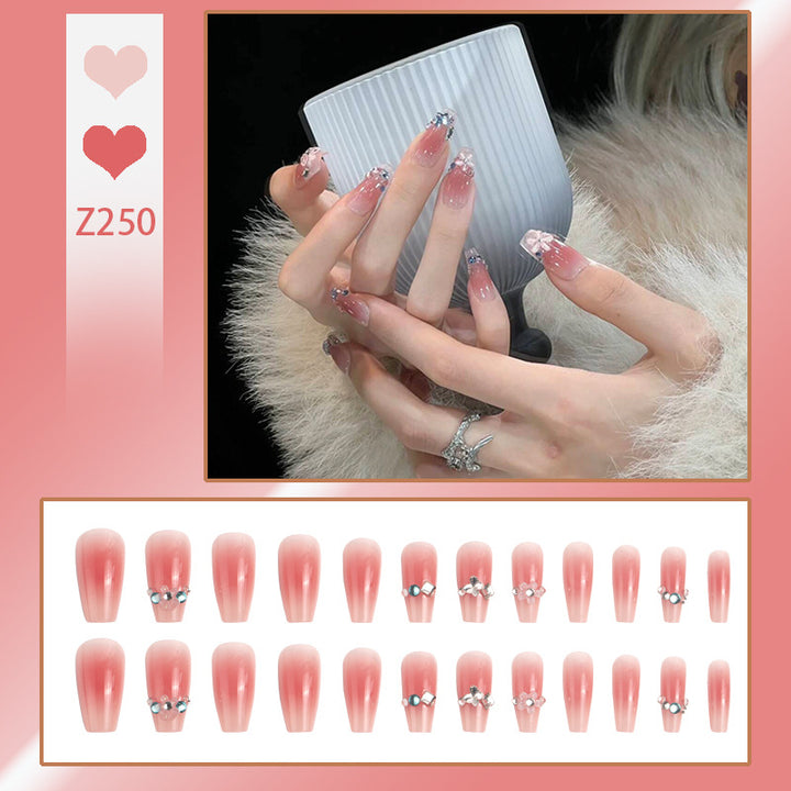 Artificial nail set with glamorous 3D decorations and shimmering accents Kalsten