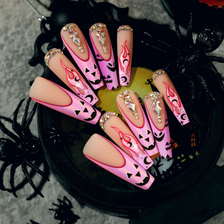 Artificial nail art with festive design and glitter variations Kalsten