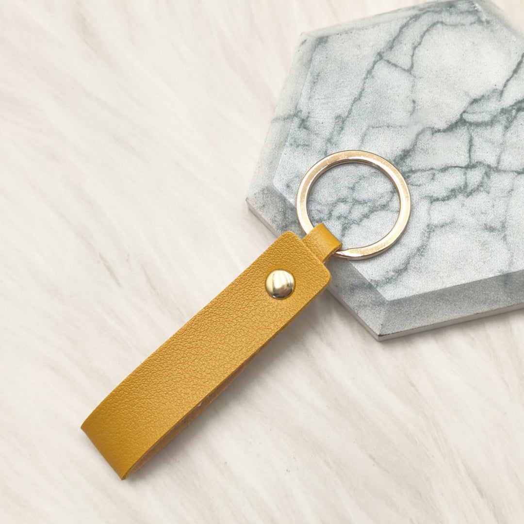 Unisex keychain made of high-quality synthetic leather with elegant metal embellishment Kalsten