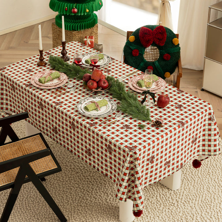 Rectangular decorative tablecloth with checkered pattern, pompom trim, and fine embroidered applique Kalsten
