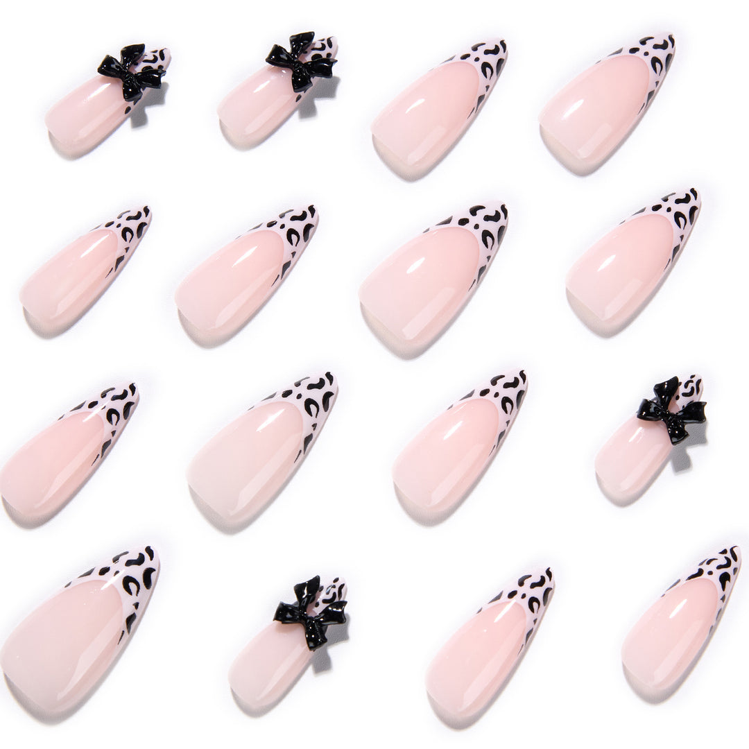 Artful Stiletto Nails with Leopard Print and Bow Accent Kalsten