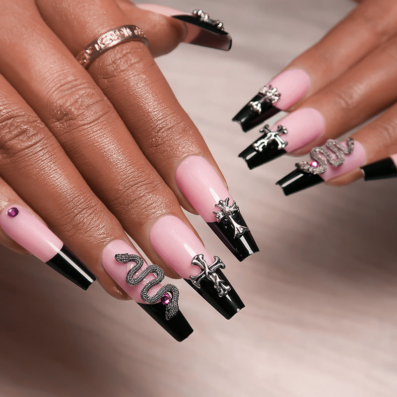 Artful stiletto nails with glitter accents and creative design Kalsten