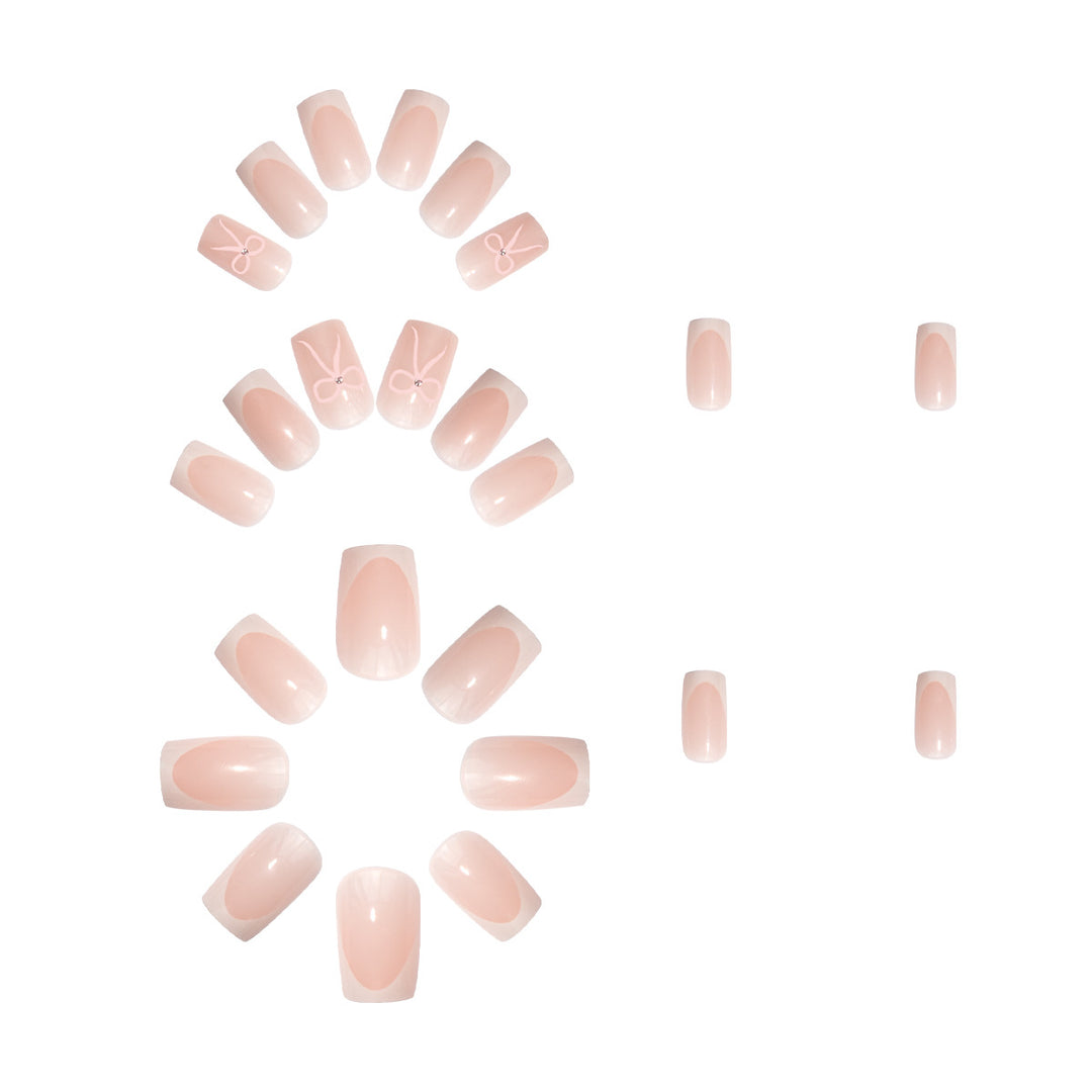 Nail art set with elegant bow and glitter accents Kalsten